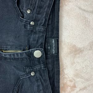 Black denim skinny ripped jeans